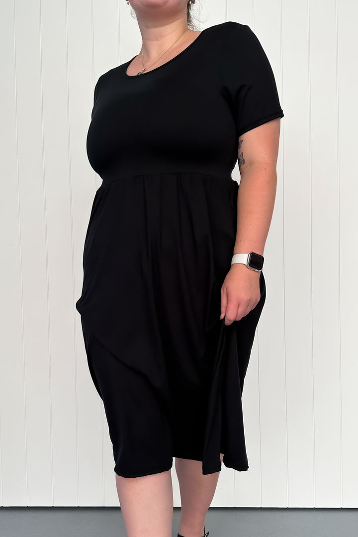 Black - Midi Dress - Short Sleeve - Pockets