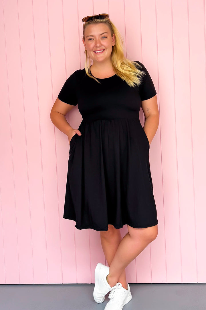 Black - Knee Length Dress - Short Sleeve - Pockets
