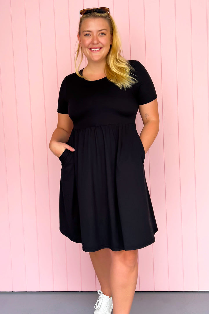 Black - Knee Length Dress - Short Sleeve - Pockets